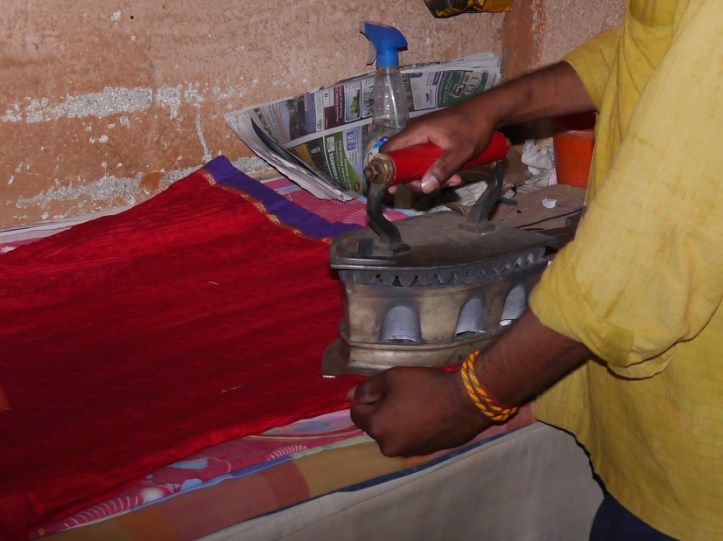 Indian iron on red cloth