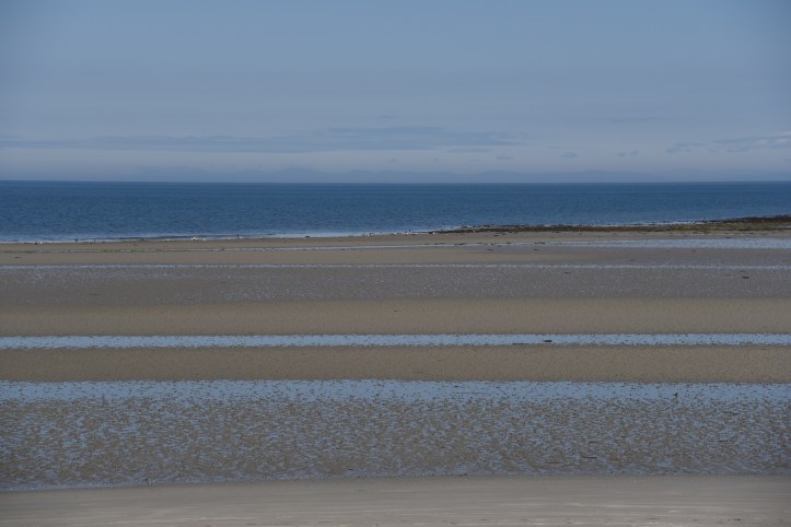 Cloughey beach from churchyard
